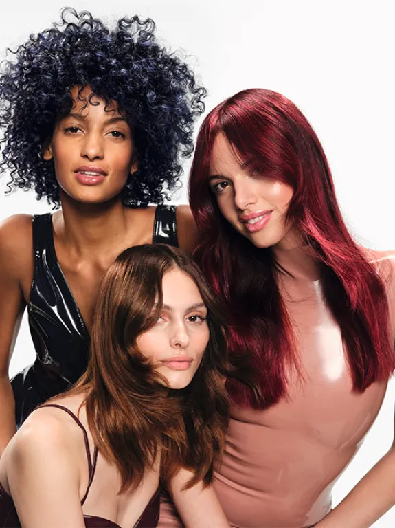 three models showing off different stylish hairstyles
